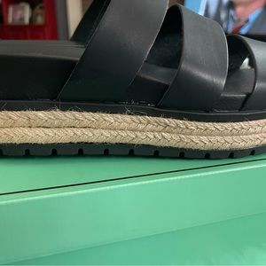 New in box Black three strike slip on sandals, 9 1/2 women’s